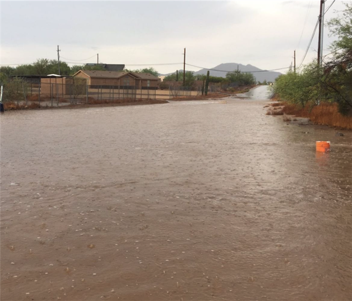 Water flooding a road in Phoenix, AZ